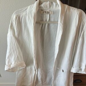 Free People women’s small. New without tags white lightweight cover 3/4 length